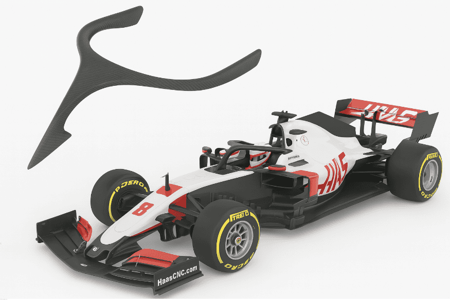 Carro de Fórmula 1 da equipe Haas com destaque para o dispositivo Halo e sua estrutura separada ao lado.